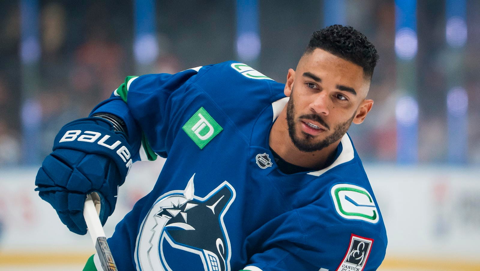 Hockey player in a Vancouver Canucks jersey