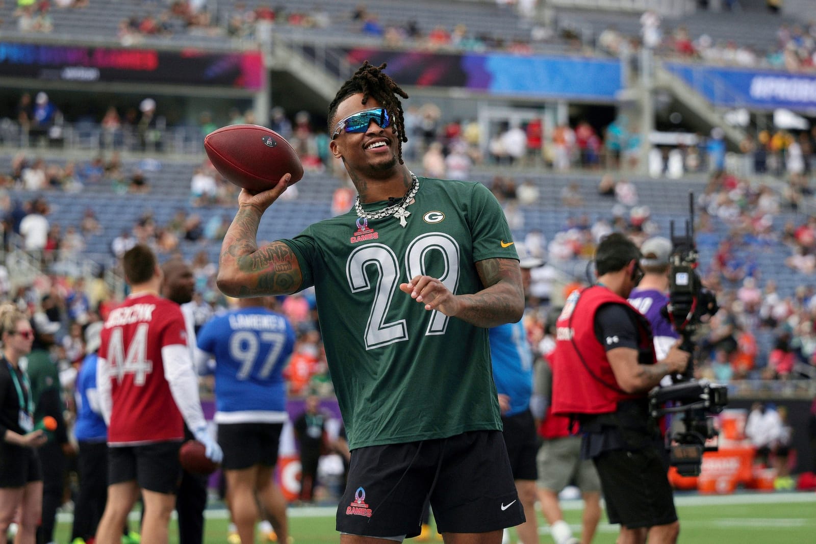 Football player throwing a pass at the Pro Bowl