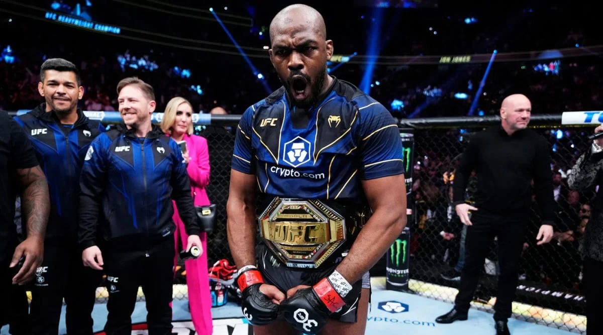 Jon Jones with the UFC championship belt